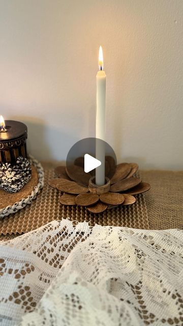 Asma Wali on Instagram: "Making candle holder using disposable wooden spoons ✨ 💫There is nothing better than stumbling upon random items  at dollar shop and realizing it could be such a great project. I stained spoons with coffee mixture. In my top pinned project I explained it in detail. You can check highlights for more details. I made a round base from popsicle sticks, cut spoons and glued them on base. In center I used wooden candle holder. You can use metal lids for base as a substitute and any perfume lid for candle holder. I covered the base with cotton twine to cover the edges. How sweet it looks! You can add any stain you like. You can also add gold leafing.   #festivedecor #homedecor #candleholder #dollartree #craftideas #diyideas #dollarstorediy #homedecorinspo #homedecoration Wood Wall Candle Holders, Making Candle Holders, Candle Holder Crafts, Diy Wood Wall, Making Candle, Gold Leafing, Wooden Candle Holder, Eco Friendly Candles, Random Items