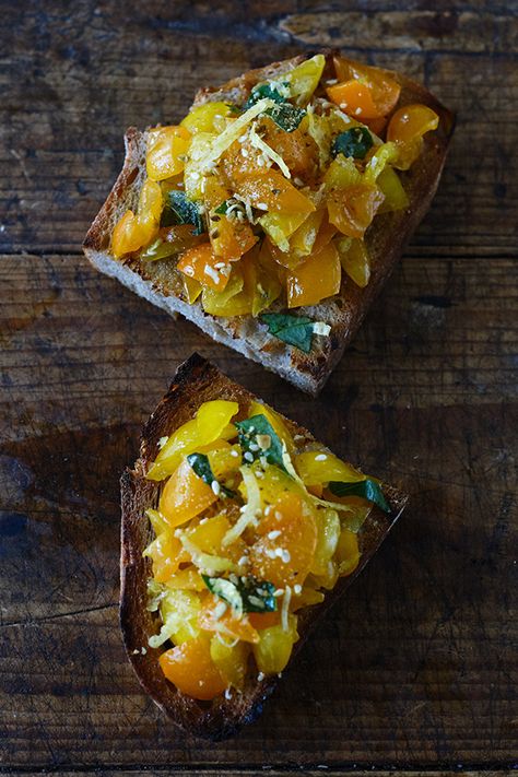 A riff on classic bruschetta. Here I use yellow teardrop tomatoes, basil, and good olive oil. A finishing sprinkle of dukkah and lemon zest brings a bit of magic. Classic Bruschetta, 101 Cookbooks, Italian Antipasto, Halloween Food Appetizers, Fancy Appetizers, Yellow Tomatoes, Tomato Bruschetta, Healthy Recipes Clean, Bruschetta Recipe