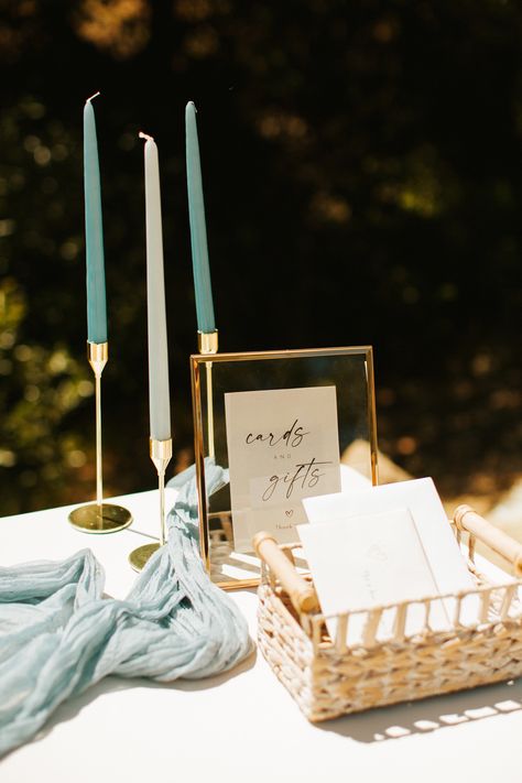 Wedding welcome table with custom wood sign guestbook for guests to sign, blue cheesecloth draping, blue taper candles, and gold accents. A summer wedding at La Cuesta Ranch in SLO, California by Phoenix wedding photographer Poppy and Vine. Wedding Table Welcome, Wedding Guest Check In Table, Garden Wedding Gift Table, Simple Guest Table Wedding, Cards And Guest Book Table, Wedding Table Guest Book, Modern Wedding Gift Table, Gifts And Cards Table Wedding, Welcome Table Decor Wedding