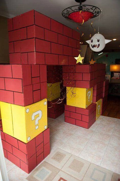 Bring Super Mario Brothers to life with these amazing brick & question mark box decorations Super Mario Brothers Party, Mario Brothers Party, Mario Kart Party, Super Mario Bros Party Ideas, Mario Bros Birthday Party Ideas, Cardboard Forts, Nintendo Party, 4de Verjaardag, Super Mario Bros Birthday Party