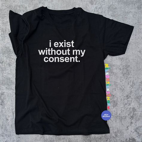 I Exist Without My Consent shirt is yet another simple statement tee with a funny slogan. This funny shirt is a perfect gift for millennials or gen z and is also a funny meme shirt to wear on your daily stroll. This sarcasm shirt surely will make everyone smile. Get this hilarious sarcastic tshirt as a funny gift for her, gift for him or anyone in between as these trendy shirts are unisex. Available in Sizes XS, S, M, L, XL, 2XL and 3XL. ✨ 100% ⭐️ PREMIUM ⭐️ Airlume combed and ringspun cotton  ✨ Light fabric ✨ Retail Unisex fit ✨ Tear away label ✨ Direct to Garment Printed - inks are incorporated on the fabric making it able to withstand more wash and wear situations. ‼️ Size will scale up or down depending on the size of the shirt. *Sustainability Commitment: All of our products are made Funny Shirt Outfit, I ❤️ Shirt, Funny Graphic Tees For Women, Silly Tshirts, Kidcore Clothing, Silly Shirts, Y2k Shirts, Funny Clothes, Silly Clothes