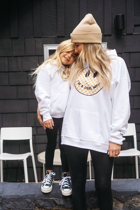 I'm a Cool Mom checkered smiley face trendy hoodie for moms. This white mom hoodie is super cozy and pairs perfectly with our Cool Dad, Cool Kid & Cool Baby matching hoodies & a onesie for the whole family! Shop the full Krista Horton x Slyfox collection for more trendy mom sweatshirts, matching family sweatshirts & everything you need to achieve the ultimate cool mom aesthetic. For Sizing Reference: Krista is wearing a sx XL Checkered Smiley Face, Matching Mommy Daughter Outfits, Family Sweatshirts, Cool Mom Style, Krista Horton, Mom Outfits Fall, Trendy Mom Outfits, Mom Aesthetic, Daughter Outfits