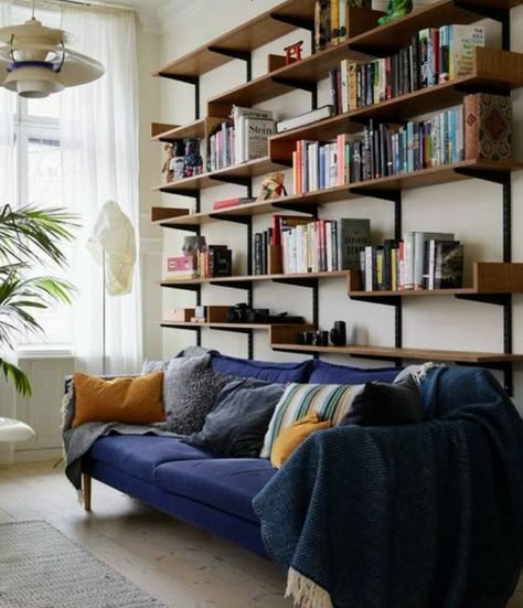 Tee Bookshelves, Shelving Above Sofa, Book Shelves Above Sofa, Bookshelf Over Couch, Book Shelves Above Couch, Bookshelves Above Sofa, Bookshelf Behind Couch Ideas, Bookshelf In Living Room Layout, Shelves Over Sofa