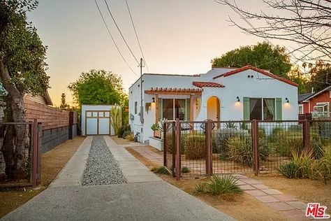 6654 Pollard St, Los Angeles, CA 90042 | MLS #21701926 | Zillow Los Angeles House Exterior, Bungalow Garage, Los Angeles Bungalow, Exterior Gate, Gate Color, Los Angeles House, Spanish Bungalow, Open Concept Living Room, Spanish Style Homes