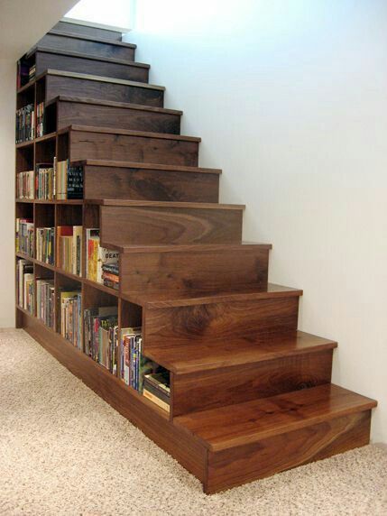 Bookshelf Staircase, Underneath Stairs, Basement Stair Railing, Staircase Bookshelf, Basement Stairs Remodel, Book Storage Ideas, Under Staircase, Basement Stair, Stairs Diy