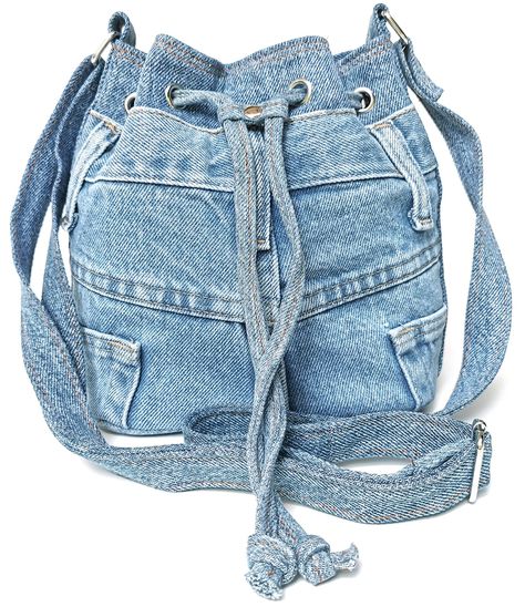 PRICES MAY VARY. Material : upcycled denim. *Please allow a little color different due to many monitors and devices resolution.* The drawstring crossbody pouch is made from the original old jean pants. Approx. measurement : H x L x W : 8 x 8 x 5 inches and adjustable long strap drop 15 - 27 inches. Weight 9 oz. The main compartment closure with denim string and fabric stopper, polyester lining, 1 zipper pocket inside, and original jean pants pockets outside as decorating, not for usage except fo Upcycling, Drawstring Crossbody Bag, Denim Crafts Diy, Jean Purses, Blue Jeans Crafts, Denim Handbags, Denim Projects, Baby Jeans, Oversized Bag