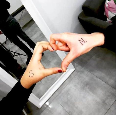 109 Hopelessly Romantic Couple Tattoos That Are Better Than A Ring Hand Tattoos For Couples, Couple Tattoos With Meaning, Unique Couple Tattoos, Matching Love Tattoos, Initial Tattoos, Love Wrist Tattoo, Infinity Couple Tattoos, Husband Tattoo, Promise Tattoo