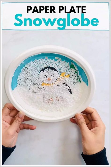 Enhance your child's artistic skills with these simple and fun paper crafts. Snow Globe Plate Craft, Paper Plate Snow Globe Craft, Paper Plate Penguin Crafts For Kids, Penguin Paper Plate Craft, Snowglobe Art For Kids, Snow Globe Crafts For Kids, Paper Plate Crafts For Preschoolers, Kids Snow Globe Craft, Paper Plate Snow Globe