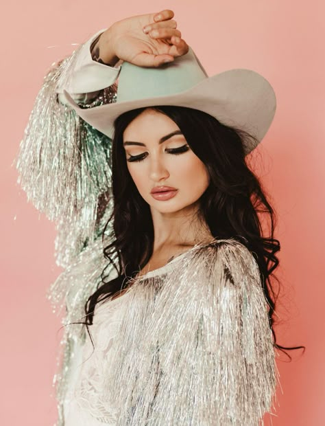 A Very Kacey Wedding Day: It's a Kacey Musgraves Wedding Inspiration! | Green Wedding Shoes Kacey Musgraves Wedding, Rhinestone Cowgirl Aesthetic, Cowgirl Makeup Ideas, Neon Cowgirl, Disco Cowboy, Cosmic Cowgirl, Cowgirl Bachelorette Parties, Cactus Rose, Flowy Gown