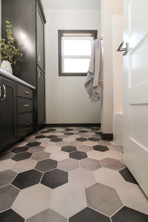 Main Bathroom with Grey, White, and Black Hexagonal Patterned Tile Flooring Black Hexagon Tile Bathroom Floor, Black And White Hexagon Tile Bathroom, Octagon Tile Bathroom, Black Bathroom Floor Tiles, White Hexagon Tile Bathroom, Hexagon Tile Bathroom Floor, Black Bathroom Floor, Grey Bathroom Floor, Black Tile Bathrooms