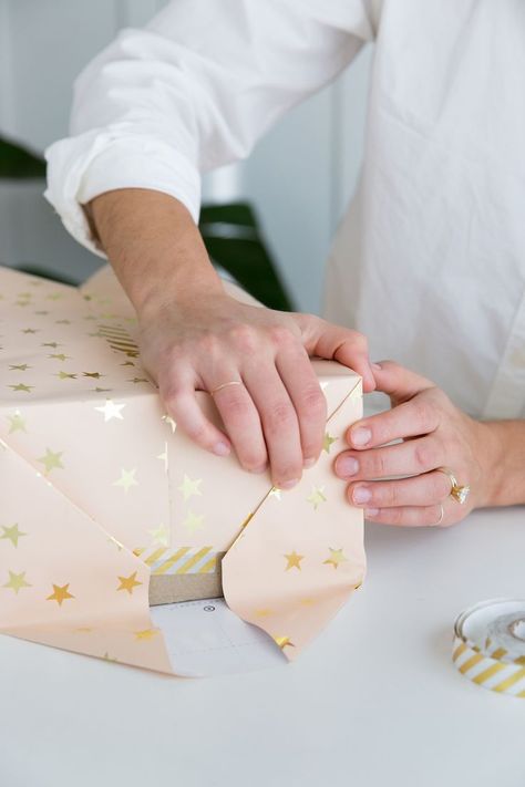 A step-by-step guide to wrapping the perfect present How To Wrap A Gift Step By Step, How To Wrap A Present Step By Step, Gift Wrapping Step By Step, How To Rap A Gift Wrapping Step By Step, How To Perfectly Wrap A Present, Wrapping A Present, How To Wrap A Box Gift, Present Wrapping Tutorial, How To Wrap A Present