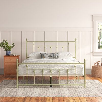 This platform bed brings a minimal and functional look to your bedroom or guest room. Its frame is made from metal, and it has a solid finish that helps it blend in with a variety of color palettes and aesthetics from farmhouses to French country. The matching headboard and footboard showcase openwork designs and slender spindle accents for a classic touch in your space. But what we really love is that this platform bed arrives with slat kits, so box springs are not needed. A mattress is not inc Affordable King Bed Frame, Bed Frames Aesthetic, Green Bed Frame, French Bed Frame, Metal Bed Frame Bedroom, Gold Bed Frame, Brass Bed Frame, French Country Bedding, Bed Frame Sets