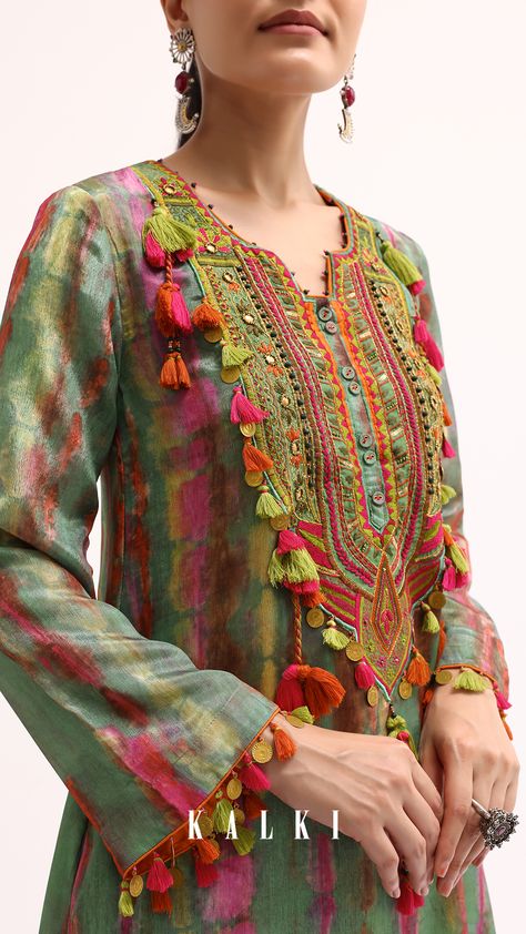 Experience the enduring allure of our green kurta pant meticulously crafted for festive occasions and celebratory moments.
This ensemble is tailored from crepe fabric and adorned with exquisite prints resham work beads sequins and tassels.
The kurta is paired with pants for a complete and stunning look. Pants Design For Kurti, Pakistani Kurti Designs, Pakistani Kurta Designs, Plain Kurti Designs, Royal Costume, New Kurti Designs, Resham Work, Classy Outfits For Women, Kurta Designs Women