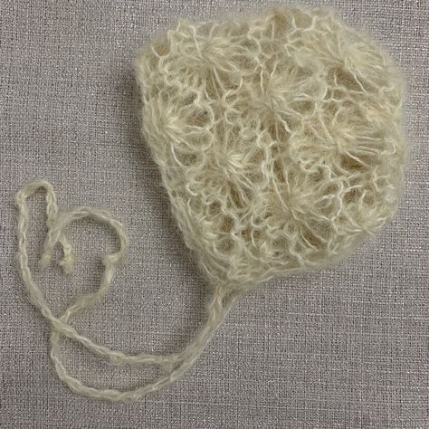 Hand knitted mohair baby bonnet//photo prop. Size newborn. Available colors: Off white, white, pink, mint. Crochet Lace Bonnet, Mohair Crochet Ideas, Crochet Bonnet Adult, Mohair Projects, Bonnet Outfit, Knitting With Beads, Mohair Bonnet, Mohair Cable Knit, Crochet Mohair