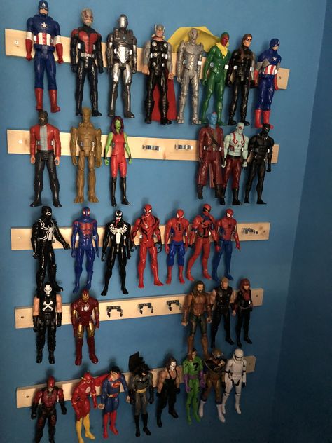 Wall mounted figure display  Using tool clips Superhero Room Decor, Marvel Bedroom, Avengers Room, Spiderman Room, Furniture Kitchen Island, Marvel Room, Superhero Bedroom, Superhero Room, Modern Kids Bedroom