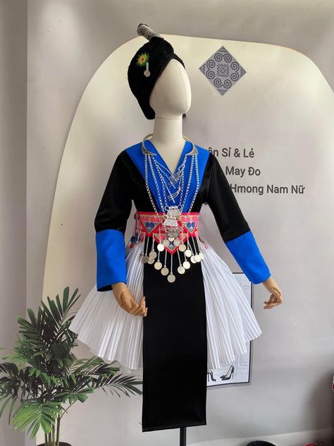 Embrace the beauty of cultural diversity and make a fashion statement with our Hmong Vintage Handmade Dress. Experience the elegance, artistry, and soul of the Hmong people, embodied in this exquisite garment. This whole outfit includes a shirt, skirt, apron and embroidered belt. The hat isn't included in the set.  If you want to buy the hat, please choose both options for the outfit and hat. Please note that due to the handmade nature of these dresses, each piece may have slight variations of p Hmong Vietnamese Outfit, Tribe Outfit, Hmong Traditional Clothing, Hmong Clothes Traditional, Modern Hmong Clothes, Hmong Dress, White Hmong Clothes, Hmong Outfit, Hmong Clothing