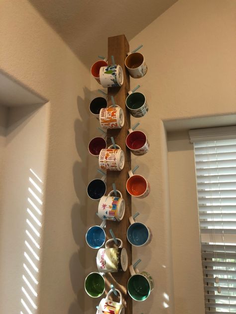 Coffee mug rack. Built with a 4x4x8’ cedar post eith dowl rods and a stand. Mug Display Ideas Craft Show, Coffee Mug Rack, Cedar Posts, Mug Display, Mug Tree, Diy Mugs, Mug Rack, A Stand, Christmas Mugs