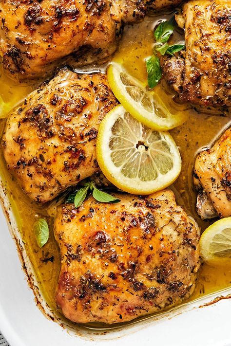 This Greek lemon chicken recipe is the best dinner with juicy, tender, and crisp baked chicken thighs coated in a delicious lemon-herb marinade. Greek Inspired Lemon Chicken Clean Food Crush, Greek Inspired Lemon Chicken, Greek Chicken With Rice Recipes, Lemon Barbecue Chicken Southern Living, Bake Lemon Chicken In Oven, Lemon Chicken Crockpot Recipes Healthy, Greek Chicken Oven Roasted, Lemon Herb Chicken Thighs, Fried Lemon Chicken Recipe