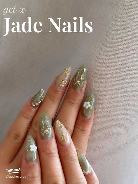 Cute Subtle Nail Designs, Sage Green Nails Inspiration, Cute Almond Nails Green, Jade Nails Designs Almond, Moss Green Nails Acrylic, Jade Almond Acrylic Nails, Gold Brown Nails Design, Jade Short Nails, Sage Green Nails With Charms