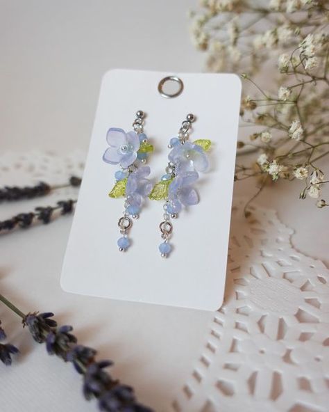 lavila🌱 on Instagram: "Shrink Plastic Earrings ‘Blue Hydrangea’  925 Sterling Silver, Hypoallergenic Steel, Stainless Steel Earring Posts Materials: •stainless steel •glass beads •shrink plastic Shipping: I ship using usps to the US only, will ship your order within 1-3 days You can find the purchase link in my profile description💗 #shrinkplastic #shrinkplasticart #makingjewelry #jewelry #phonecharm #acccessories #necklace #earrings #handmadephonecharm #hairpins #handmadehairpins #handmadenecklace #handmadeearrings #smallbusiness #smallbusinessowner #smallbusinesssupport #lavilajewelry" Shrinky Dink Flowers, Shrink Plastic Ideas, Hydrangea Jewelry, Hydrangea Aesthetic, Hydrangea Earrings, Diy Shrink Plastic Jewelry, Shrink Plastic Earrings, Diy Shrink Plastic, Accessories Idea