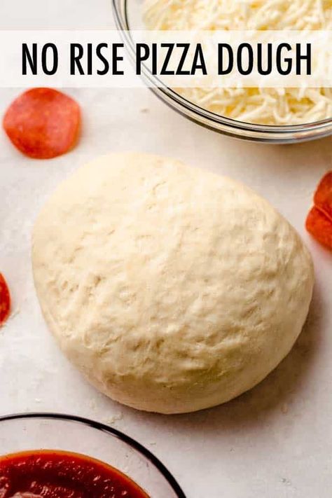 This easy homemade pizza dough recipe requires no rising time and is ready for all your favorite toppings in under 30 minutes. Recipe includes instructions for preparing ahead of time or freezing to use at a later time. via @frshaprilflours Easy Homemade Pizza Dough Recipe, Homemade Frozen Pizza, No Rise Pizza Dough, Pan Pizza Recipe, Easy Homemade Pizza Dough, Sheet Pan Pizza, Homemade Pizza Dough Recipe, No Yeast Pizza Dough, Homemade Pizza Dough Easy