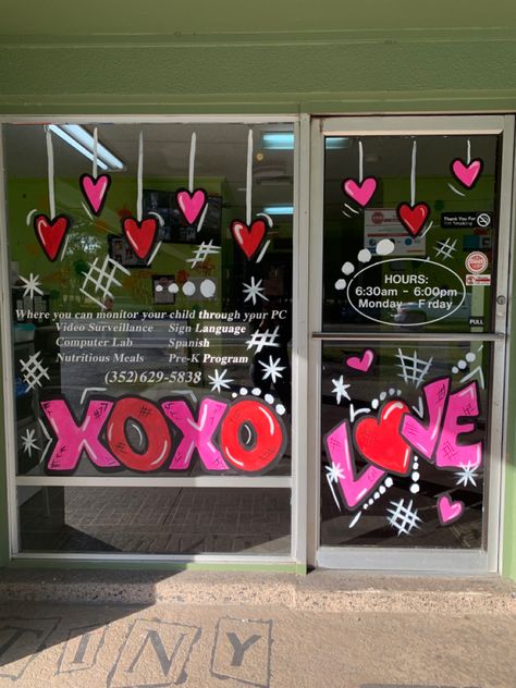 Window Art For Valentines Day, Valentine Boutique Window Display, February Window Art, February Window Display, Valentine Day Window Display Ideas, Valentine’s Day Store Window, Valentine Store Window Display, Boutique Window Painting, Valentines Day Window Chalk Art