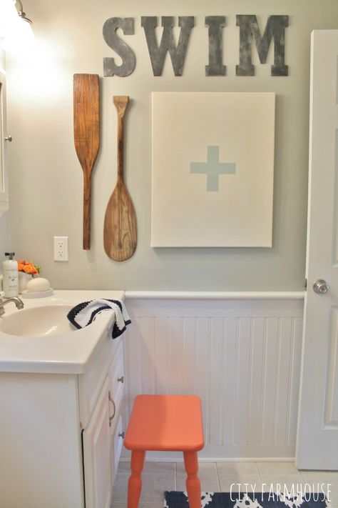 Preppy Coastal Bathroom Makeover- DIY Lifeguard Art, Vintage Paddles & Soapstone Letters {City Farmhouse} Pool Bathroom Ideas, Pool House Bathroom, Pool House Decor, City Farmhouse, Diy Bathroom Makeover, Preppy Coastal, Coastal Bathroom, Pool Bathroom, Pool Bath