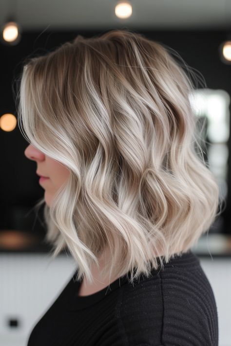 Short Hair With Lowlights Blonde, Dimensional Short Blonde Hair, Angled Lob Haircut Thick Hair, Short Shadow Root Blonde Hair, Blonde Wavy Lob, Blonde Bob For Fine Hair, Blonde With Subtle Lowlights, Short Blonde Hair Root Smudge, Medium Blonde Bobs Fine Hair