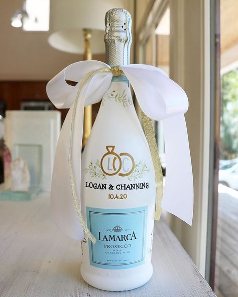 @savsandpaints shared a photo on Instagram: “Helping celebrate another sweet engagement in Oxford! Congratulations to @logan.alpe 🤩” • Oct 6, 2020 at 9:18pm UTC Painted Wine Bottle Engagement, Diy Gifts For The Bride, Wedding Day Champagne Bottle, Engagement Bottle Decoration, Bridal Shower Painted Champagne Bottle, Engaged Champagne Bottle, Hand Painted Champagne Bottle Engagement, Painting A Champagne Bottle, Engagement Wine Bottle