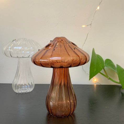 Add a touch of whimsy to your decor with our enchanting glass mushroom vase! 🍄✨ Perfect for fresh blooms or as a standalone piece. How would you style it? #mushroomvase #mushroomvases #mushroomvase🍄 #mushroomgift #mushroomgifts #mushroomgifting #mushroomdecor #uniquevase #uniquevases Mushroom Vase, Vase Aesthetic, College House, Pinterest Contest, Brown Mushroom, Glass Mushrooms, Mushroom Decor, Unique Vases, Bedroom Inspo