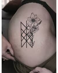 Viking symbol with wildflowers 🌸 Done by... - A Fine Madness Tattoo | Facebook Madness Tattoo, Viking Symbol, Rune Tattoo, Viking Symbols, Viking Runes, Compass Tattoo, Runes, Geometric Tattoo, Flower Tattoo