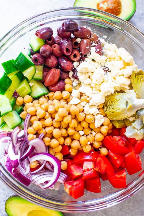 Loaded Greek Salad - An amped up version of a classic Greek salad with avocado, artichokes, garbanzo beans, and more!! The tangy Greek salad dressing is ready in seconds and is a major flavor booster! Naturally gluten-free and vegetarian!! Classic Greek Salad, Garbanzo Bean Recipes, Gyro Salad, Garbanzo Beans Salad, Homemade Tzatziki Sauce, Garbanzo Bean, Greek Salad Dressing, Salad With Avocado, Greek Lemon Chicken