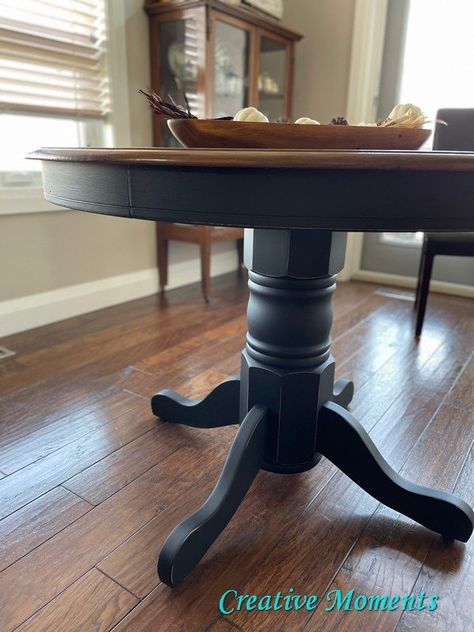 Refinish Old Wood Table, Black And Wood Kitchen Table Farmhouse, Table Top Stain Ideas, Repurposed Oak Table, Round Pedestal Table Makeover, Black Table With Stained Top, Round Wood Table And Black Chairs, Black Table Wood Top, Black And Walnut Dining Room