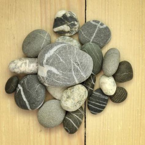 Find the flattest side of the stone to adhere to wood. How To Carve Rocks, Gluing Rocks To Wood, How To Make A Rock Cairn, Polish Rocks With Dremel, Beach Rocks Crafts, Mosaic Rocks Lowe's, Stone Glue, Paint Stone, Rock Crafts Diy