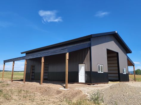 36' x 48' x 16' with (2) 12' x 48' open lean-tos featuring 12' x 14' overhead door, (2) 4' x 3' windows and 2' overhangs. Thinking about building? Now scheduling for spring 2023. Give us a call today to start your dream build 800-833-9997 View more builds on our online gallery: https://steelstructuresamerica.com/garages-shops⁠ #garage #customshop #steelstructuresamerica #mancave Metal Building With Loft, Shop With Overhang, Shop With Lean To On Both Sides, Metal Shop Interior, 50x60 Shop, Shops Garage, Pole Building Garage, Steel Garage Buildings, Pole Barn Shop