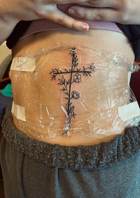 Side Tattoos For Women Rib, Cute Tattoos For Women Ribs, Cute Country Tattoos For Women, Rib Cross Tattoos For Women, Joshua 1 9 Tattoo With Cross, Rib Tattoos For Women Flower, Flower Cross Rib Tattoo, Front Rib Tattoos For Women, Tattoo Ideas Western Simple