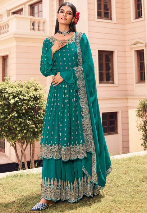 Faux Georgette Pakistani Suit in Teal Blue This Semi-stitched attire with Poly Shantoon Lining is Enhanced with Zari and Sequins Work and is Crafted in Round Neck and Bell Sleeve Available with a Faux Georgette Sharara in Teal Blue and a Faux Georgette Dupatta in Teal Blue The Kameez and Bottom Lengths are 46 and 40 inches respectively Do note: Accessories shown in the image are for presentation purposes only and length may vary upto 2 inches.(Slight variation in actual color vs. image is possi Blue Sharara, Frock Style, Georgette Dupatta, Palazzo Suit, Sharara Suit, Pakistani Salwar Kameez, Georgette Dress, Salwar Kameez Designs, Pakistani Suits