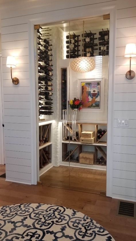 White shiplap wine cellar Wine Cellar Small, Wine Cellar Closet, Under Stairs Wine Cellar, Wall Clock Ideas, Home Wall Decor Living Room, Wine Room Design, Home Wine Bar, Wine Cellar Basement, Wine Closet