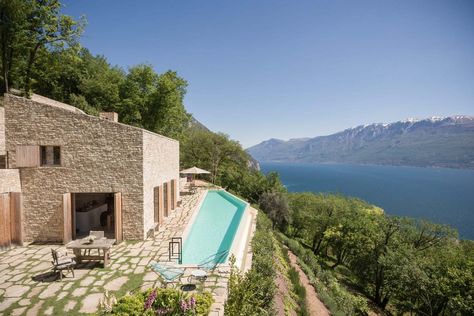 Stone clad retreat with breathtaking views of Lake Garda, Italy Lake Garda, Rustic Renovations, Case In Pietra, Stone Building, Garda Italy, Casa Country, Stone Architecture, Pool Design, Stone House