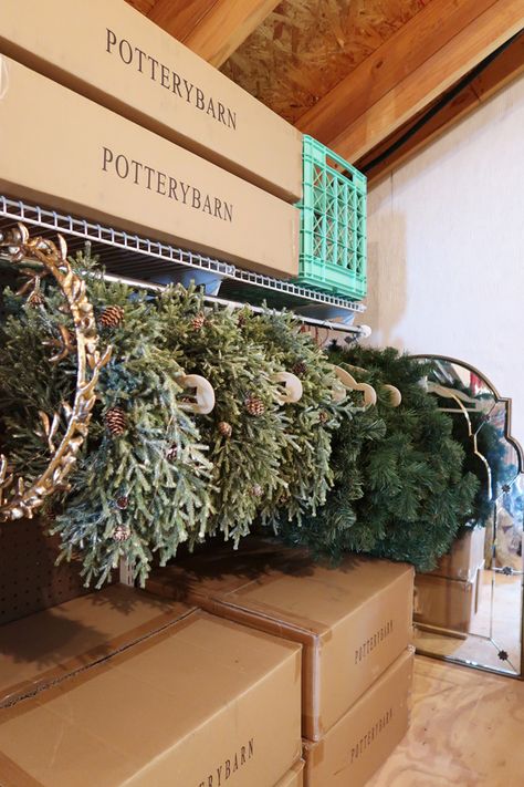 Are you looking for a better way to store your Christmas wreaths? A smart new solution to store, organize, and keep your wreaths looking good! Create hanging storage in a garage, attic, closet, or basement. #wreathstorage #howtohangwreaths #organizechristmasdecor #hangwreaths #porchdaydreamer Store Christmas Decorations, Unfinished Attic, Attic Organization, Christmas Decoration Storage, Easy Ornaments, Wreath Storage, Storing Christmas Decorations, Attic Closet, Add Storage