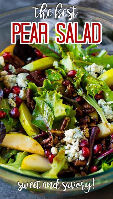 This pear salad recipe is mixed greens with fresh sliced pears, pomegranate seeds, blue cheese and candied pecans, all tossed in a homemade dressing. Pear And Blue Cheese Salad, Pear Salad Recipes, Winter Salad Recipes, Blue Cheese Salad, Green Salad Recipes, Pomegranate Salad, Sliced Pears, Salad Mixed Greens, Fresh Salad Recipes