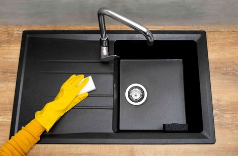 Black composite sinks are durable and stylish, but to keep yours in great shape for years, you'll need to clean it with the proper solution and materials. Homemade Drain Cleaner, Composite Sinks, Composite Kitchen Sinks, Quartz Sink, Clean Kitchen Sink, Composite Sink, Black Kitchen Sink, Mudroom Ideas, Black Sink