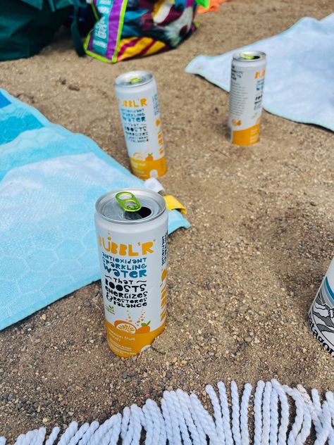 Bubblr, beach day, beach towels, drink bubblr, sparkling water, antioxidant water Antioxidant Water, Summer Moodboard, Alcohol Bottles, Instagram Pics, Energy Drink, Summer 24, Sparkling Water, Summer Feeling, Grad Party