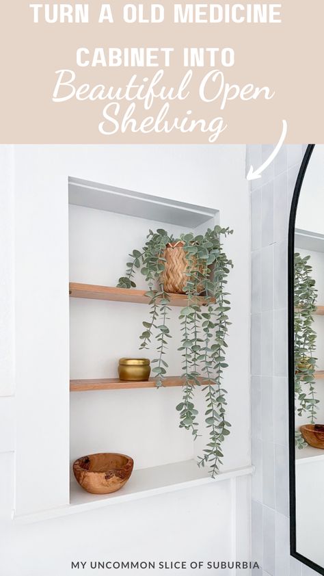 Upcycle your old medicine cabinet into trendy and beautiful open shelving! Follow our easy DIY tutorial to repurpose and revamp your space. Perfect for a modern and functional home makeover. 🏡✨ This DIY project was such an easy way to create beautiful bathroom storage and made a big impact on this bathroom redo!#DIYHomeDecor #Repurpose #UpcycleIdeas #DIY #myuncommonsliceofsuburbia Medicine Cabinet Into Shelves, Convert Medicine Cabinet To Shelves, Recessed Shelves Between Studs, Removing Medicine Cabinet Ideas, Bathroom Wall Cabinet Makeover, Bathroom Decorative Shelves, Open Shelf Medicine Cabinet, Medicine Cabinet Niche Ideas, Medicine Cabinet To Open Shelves