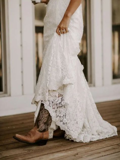 Cowboy Boots Under Wedding Dress, Cowboy Boots Wedding Photos, Boots Under Wedding Dress, Wedding Dresses And Cowgirl Boots, Wedding Dresses And Cowboy Boots, Boots With Wedding Dress Boho, Lace Wedding Dress With Cowboy Boots, Country Wedding Dress With Boots, Cowboy Boot Wedding Dress