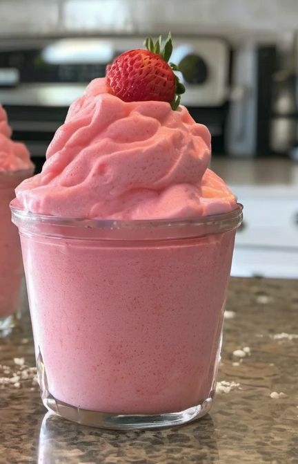 Refreshing Strawberry Dole Whip Recipe for Every Occasion Diy Dole Whip, Strawberry Dole Whip Recipe, Dole Whip Disney Recipe, Strawberry Dole Whip, Frozen Strawberry Recipes, Homemade Ice Cream Recipes Machine, Dole Recipes, Cheesecake Bars Easy, Dole Whip Recipe