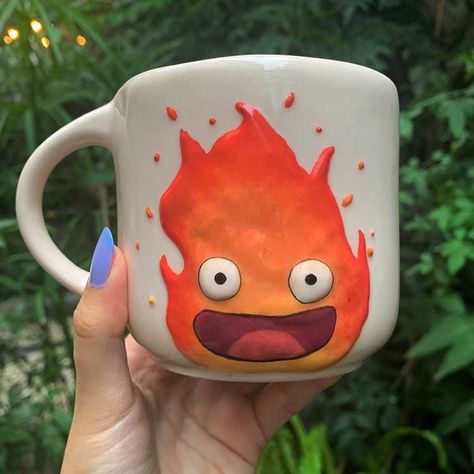 @tubyceramics on Instagram: “MAY•ALL•YOUR•BACON•BURN!🔥 Hopefully this Calcifer won’t burn your bacon✨More Ghibli mugs are coming soon! Stay tuned🧡 DM me to purchase…” May All Your Bacon Burn, Coming Soon Stay Tuned, Diy Pottery Painting, Color Me Mine, Affordable Aesthetic, Ceramic Inspiration, Pottery Painting Designs, Keramik Design, Ceramics Ideas