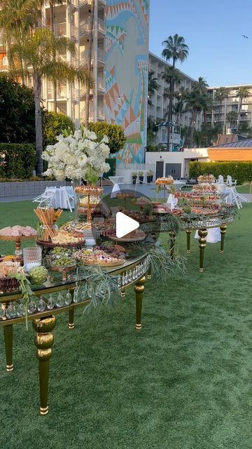 𝑪𝒉𝒊𝒄 𝑪𝒉𝒂𝒓𝒄𝒖𝒕𝒆𝒓𝒊𝒆 on Instagram: "Love, laughter and cocktails were surrounding this grazing table spread 🧀🍷🥖🍇🥂

Outdoor set ups can be a challenge, but the weather was perfect for this event 🙌🏽

We had the honor to create this stunning courtyard cocktail hour for the newlyweds @nadeen_germukly & @marwanbota 💍 Congratulations on your beautiful wedding! Wishing you all the best✨🤍

Venue @towncountrysd 
Event coordinator @eventsandmor 
Finger foods provided by @zenas.table.catering 
Honeycomb ~ @dushahoney (for inquiries dm me)" Wedding Cocktail Hour Food Table, Grazing Table Ideas Wedding Cocktail Hour, Cocktail Table Ideas Wedding, Finger Food Grazing Table, Hot Grazing Table, Buffet Table Backdrop Ideas, Finger Food Table Decor, Finger Foods Table Party Ideas, Cocktail Party Table Set Up