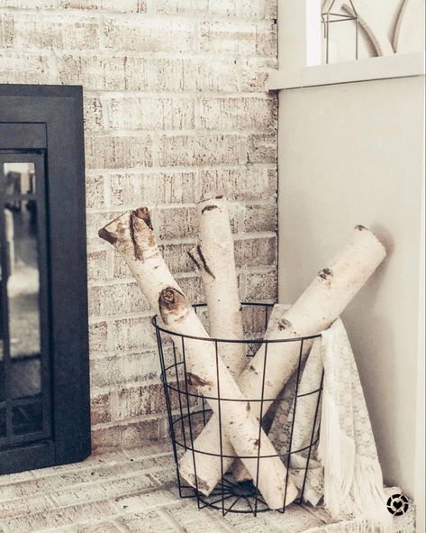 http://liketk.it/30hOz @liketoknow.it #liketkit #StayHomeWithLTK #LTKhome fireplace decor. birch logs. metal basket Basket With Birch Logs, Birchwood Fireplace Decor, Birch Wood Logs Decor, Birch Tree Decor Living Room, Fireplace With Birch Logs, Fireplace Basket With Logs, Birch Branches In Basket, Birch Logs In Basket, Decorative Birch Logs