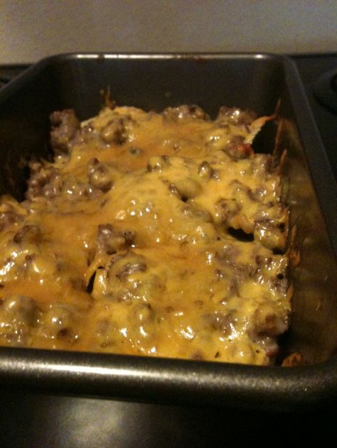 Brown lb beef w diced onions cumin salt& pepper to taste Drain Mix in cream of mushroom& 1/2 can Ro-tel Layer litly greased loaf pan w crushed tortilla chip til bottom of pan covered Dump 1/2 meat mix on top then shredded cheddar cheese on that Repeat Bake  350 10 min til cheese is warm bubbly King Ranch Casserole, Cowboy Casserole, Beef Casserole, Beef Dishes, Casserole Dish, Ground Beef Recipes, Main Dish Recipes, Om Nom, I Love Food